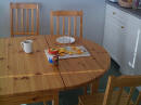 Oranges on the table.  Always eating healthy.